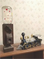 Locomotive and candy dispenser