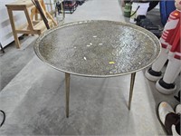 Vintage round cast metal coffee table