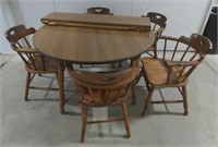 (J) Round Dining table with chairs and leaves.