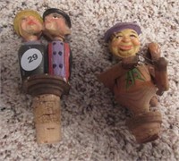 (2) Cork wine stoppers.