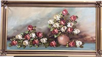 Large painting of roses in vase in molded corners
