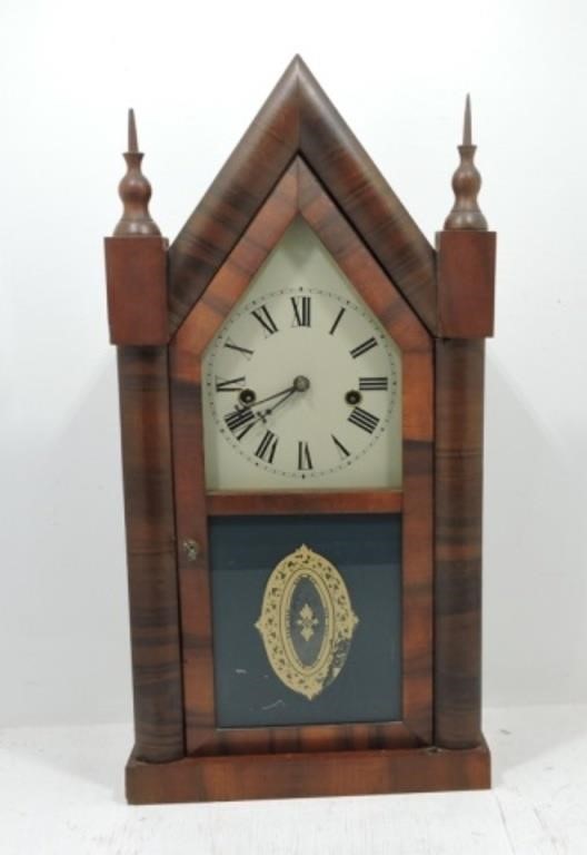 Waterbury steeple clock with key and pendulum