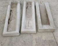 3 concrete gutter blocks