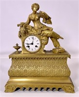 Gilt bronze mantle clock, figural, enamel dial,