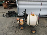 Sprayer on a cart. Briggs Stratton engine.