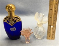 Lot of 2 perfume bottles, and a perfume topper   (