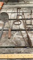 Vintage metal items, rug beater, slotted ladle,n