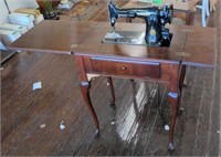 Antique sewing machine table w/ singer sewing