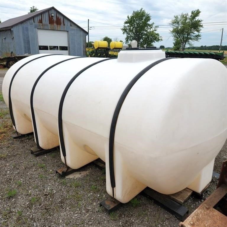 Plastic 1635 Gal Water Tank on Frame.