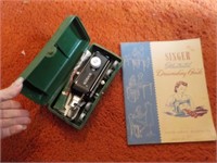 singer sewing machine book and button holer