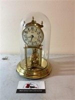 Glass dome anniversary clock