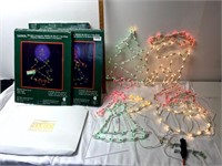 Light sculpture & 3 lighted Christmas silhouettes