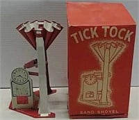 Tick tock sand shovel