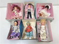 Madame Alexander collectible dolls in boxes.