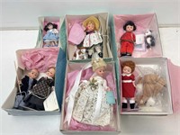 Madame Alexander collectible dolls in boxes.