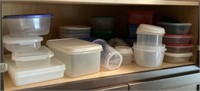 Plasticware in kitchen cabinet