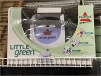 little green Bissell carpet cleaner