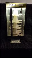 Zippo display case. Lighted and rotating