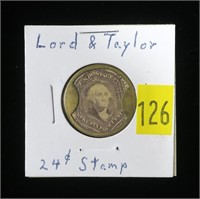 U.S. encased postage stamp "Lord & Taylor" $.24