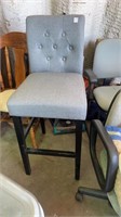 Bar stool - gray cloth with black wooden legs