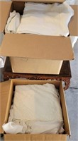 E - 2 BOXES OF TABLE LINENS (G136)