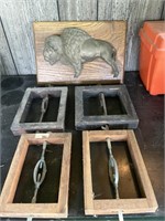 Four antique bed clamps and cast iron bison