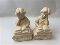 Two Sculptures Kid Reading Book