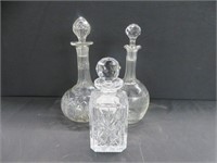 3 CRYSTAL DECANTERS W/ STOPPERS