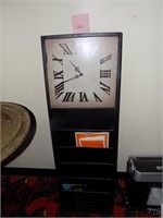 clock with rack below
