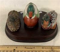 THREE DUCKS ON WOODED STAND