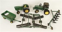 Two John Deere Cast Tractors w/ Equipment
