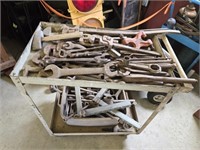 White metal cart full of tools