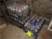 3 plastic pepsi crates 69 bottles 5 cans