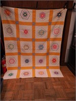 Vintage handstitched quilt with applied flowers,