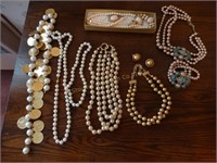 Costume jewelry- necklaces, clip on earrings,