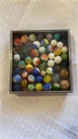Various machine and hand made marbles.