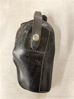 Black leather holster by Hoyt. 8 inches long