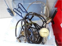 Various intake AC gauges & hoses in blue storage