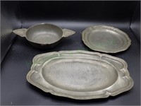 Trio of vintage pewter serving dishes
