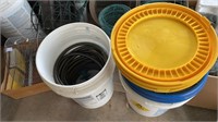 Garden hose & guides/ in buckets