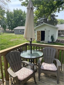 Patio table and chairs with umbrella