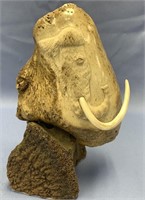 Relief carving of a wooly mammoth by Michael Scott