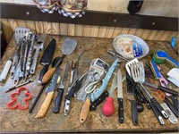 Lot of kitchen utensils, knives and more