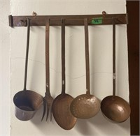 Vintage copper kitchen utensils with hanger