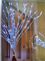 2-4 ft lighted trees takes 22aa batteries each