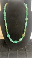 Mid length blue and green beaded necklace