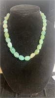Shorter length pale green beaded necklace