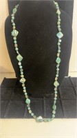 Long strand blue and green beaded necklace