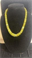 Shorter length yellow/green stacked disc necklace