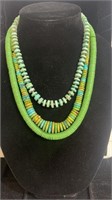 Three green and turquoise stacked disc necklaces